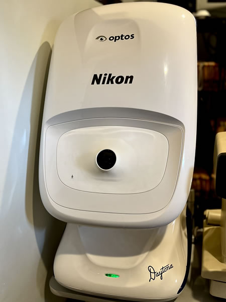 Our Optomap®️ imaging machine safely scans your eyes to assess your vision health.